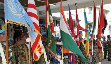 Contingents display flags on 2015 UN Peacekeepers' Day in Monrovia