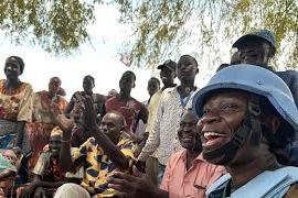 peacekeepers with community members.