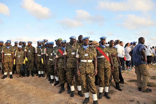 UN military personnel stand in a group outside