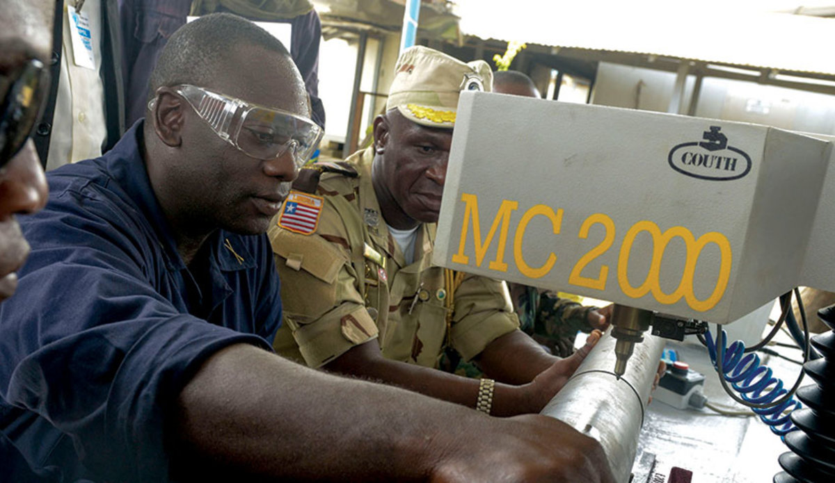 Staff from Liberia security agencies being trained in arms marking