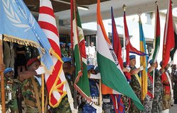 Contingents display flags on 2015 UN Peacekeepers' Day in Monrovia